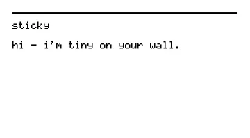 the Sticky e-ink display on a wall reading “hi - i’m tiny on your wall.”